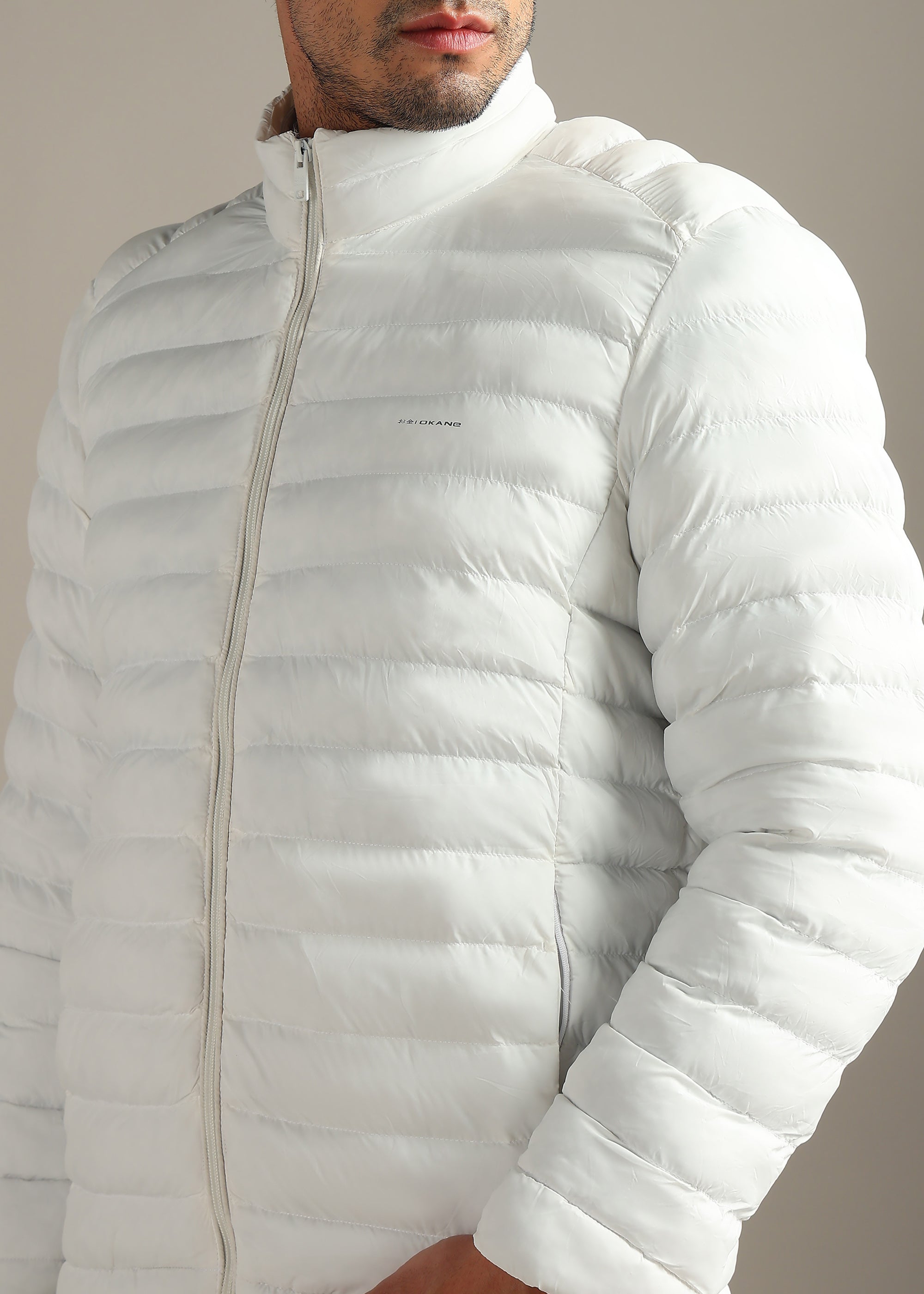 WHITE WEIGHTLESS WARMTH + PORTABLE FULL SLEEVE JACKET